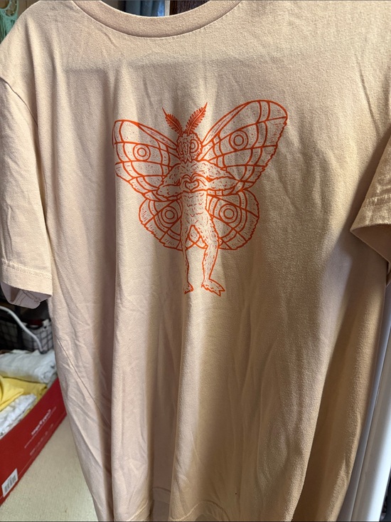 Bella Canvas Tops - Mothman Graphic Tee in Peach with Orange Print